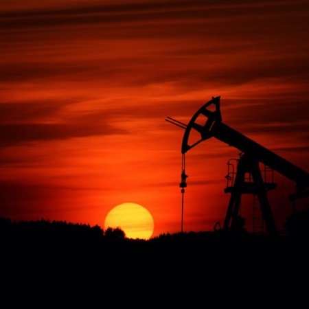 Gas drill in blazing red sunset